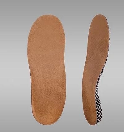 На фото – ортопедические стельки от продольного плоскостопия